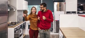 Couple choosing appliances